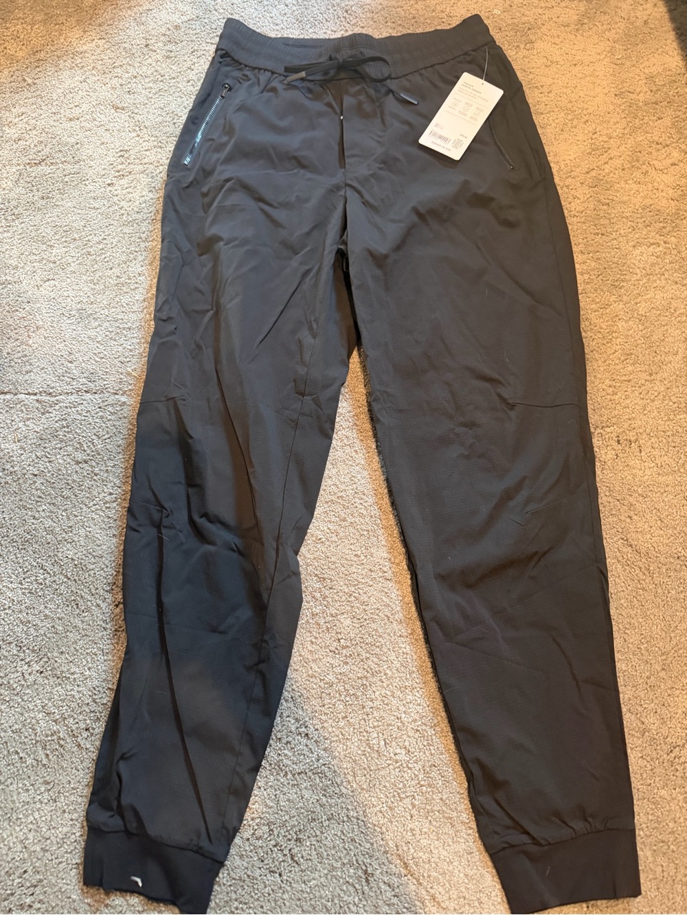 Athleta Black Lightweight Track Joggers with Zip Pockets